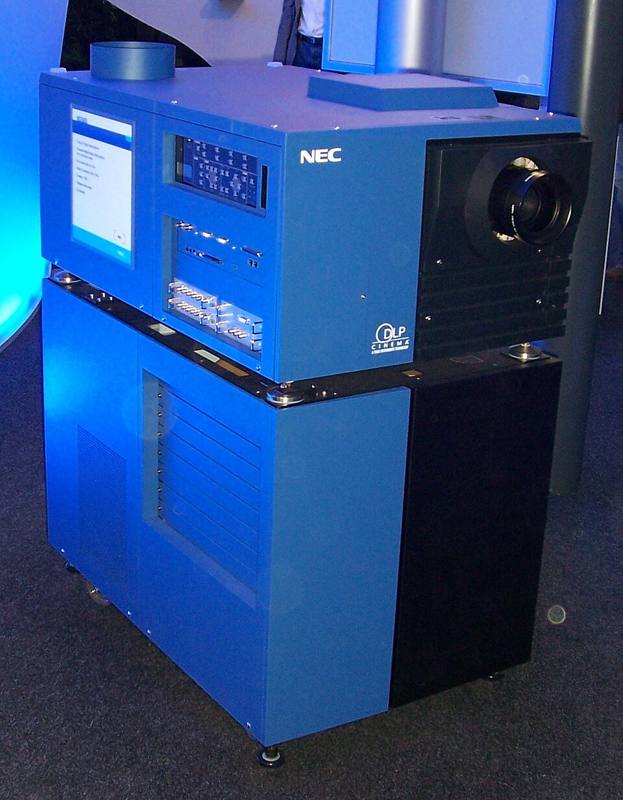 A digital cinema projector on display at a trade show